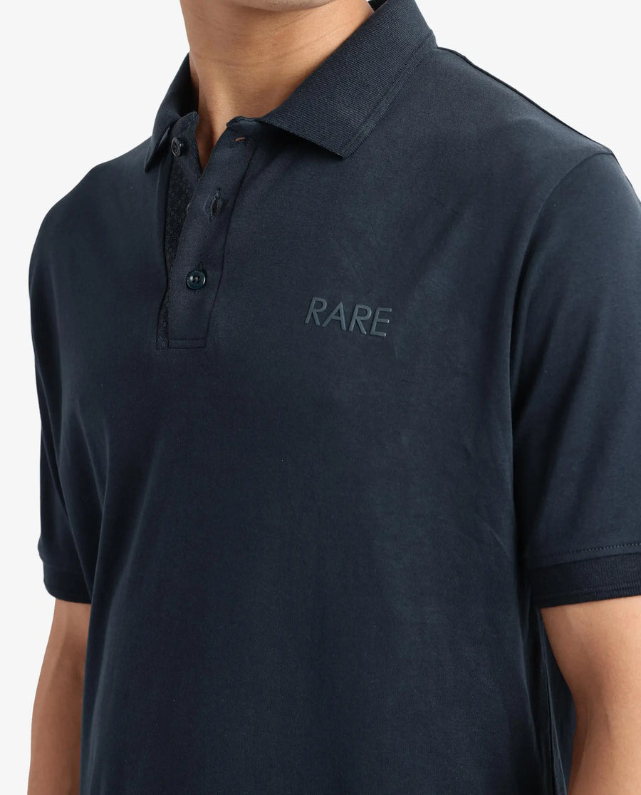 Rare Rabbit Men's Laur Dark Green Cotton Plain Regular Fit Half Sleeve Polo