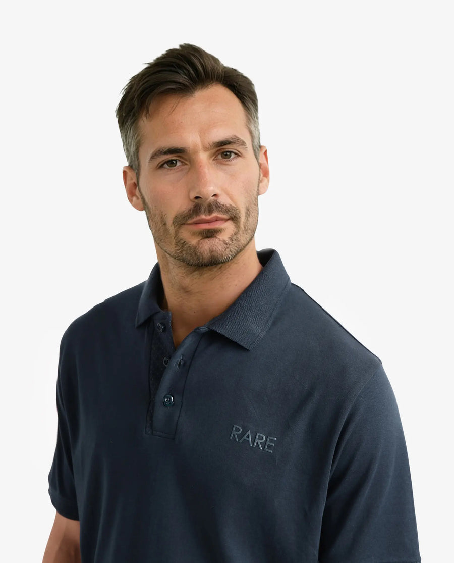 Rare Rabbit Men's Laur Dark Green Cotton Plain Regular Fit Half Sleeve Polo