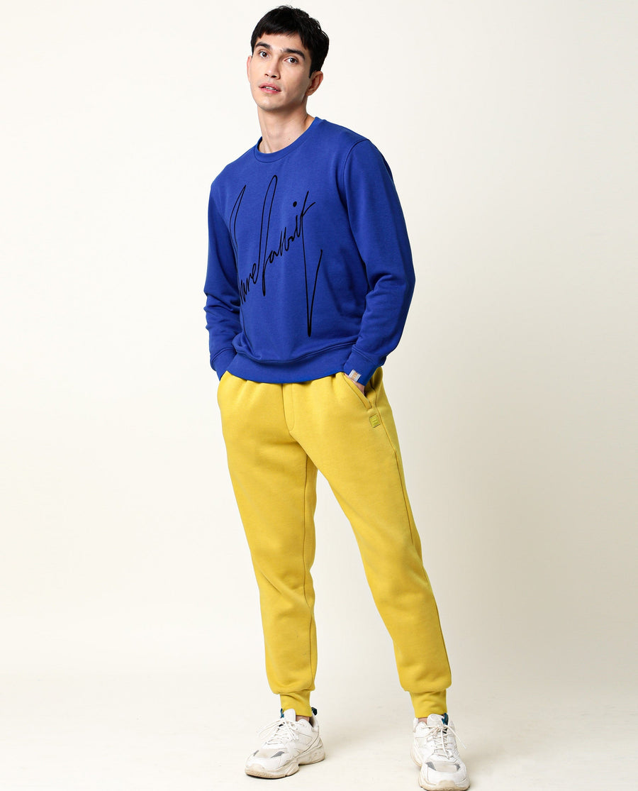 Rare Rabbit Men's Chase Mustard Cotton Plain Regular Fit Track Pant