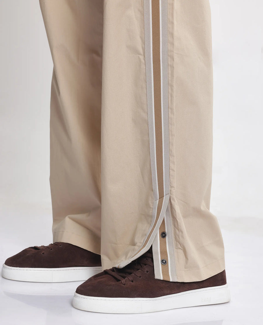 Rare Rabbit Men's Macon Beige Cotton Plain Baggy Fit Track Pant