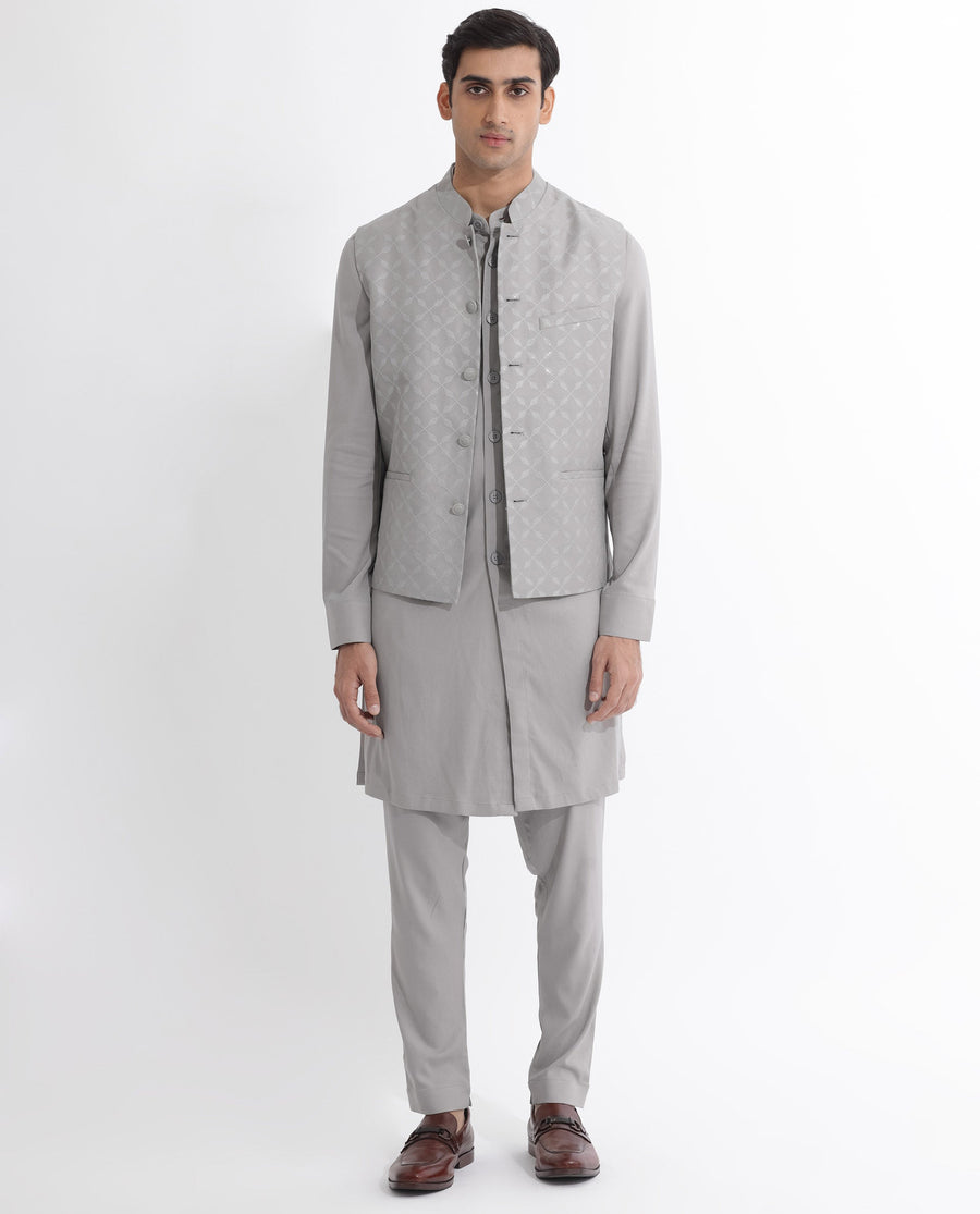 Rare Rabbit Men's Medob Grey Viscose Embroidered Tailored Fit Sleeveless Mandarin Collar Bandhgala Rare Rabbit Men's Lasmos-B1 Beige Viscose Embroidered Regular Fit Sleeveless Mandarin Collar Bandhgala Nehru Jacket