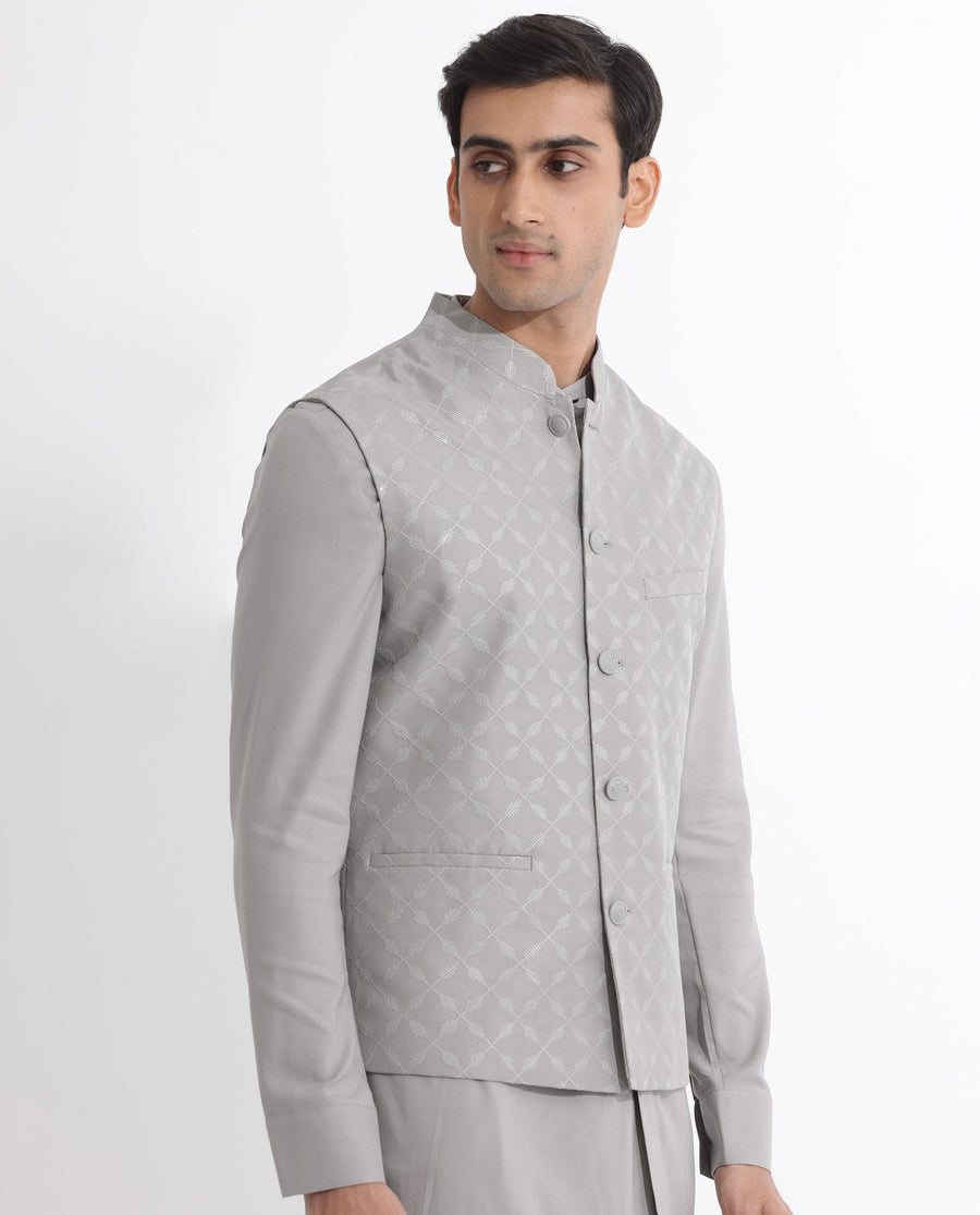 Rare Rabbit Men's Medob Grey Viscose Embroidered Tailored Fit Sleeveless Mandarin Collar Bandhgala Rare Rabbit Men's Lasmos-B1 Beige Viscose Embroidered Regular Fit Sleeveless Mandarin Collar Bandhgala Nehru Jacket