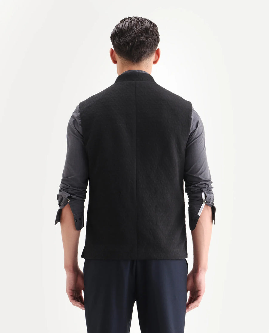 Rare Rabbit Men's Mitzi Black Cotton Jacquard Tailored Fit Sleeveless Mandarin Collar Bandhgala Rare Rabbit Men's Lasmos-B1 Beige Viscose Embroidered Regular Fit Sleeveless Mandarin Collar Bandhgala Nehru Jacket