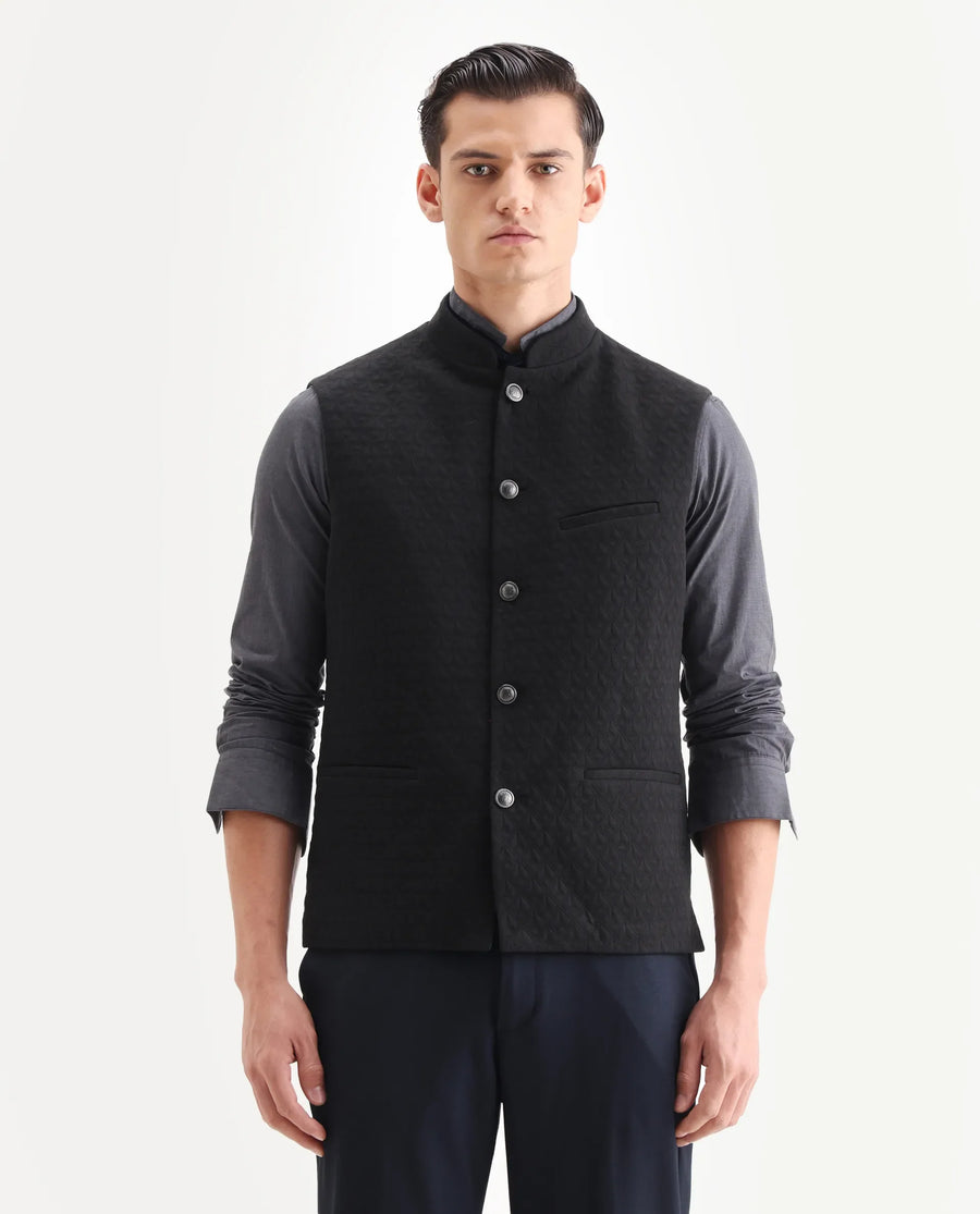Rare Rabbit Men's Mitzi Black Cotton Jacquard Tailored Fit Sleeveless Mandarin Collar Bandhgala Rare Rabbit Men's Lasmos-B1 Beige Viscose Embroidered Regular Fit Sleeveless Mandarin Collar Bandhgala Nehru Jacket
