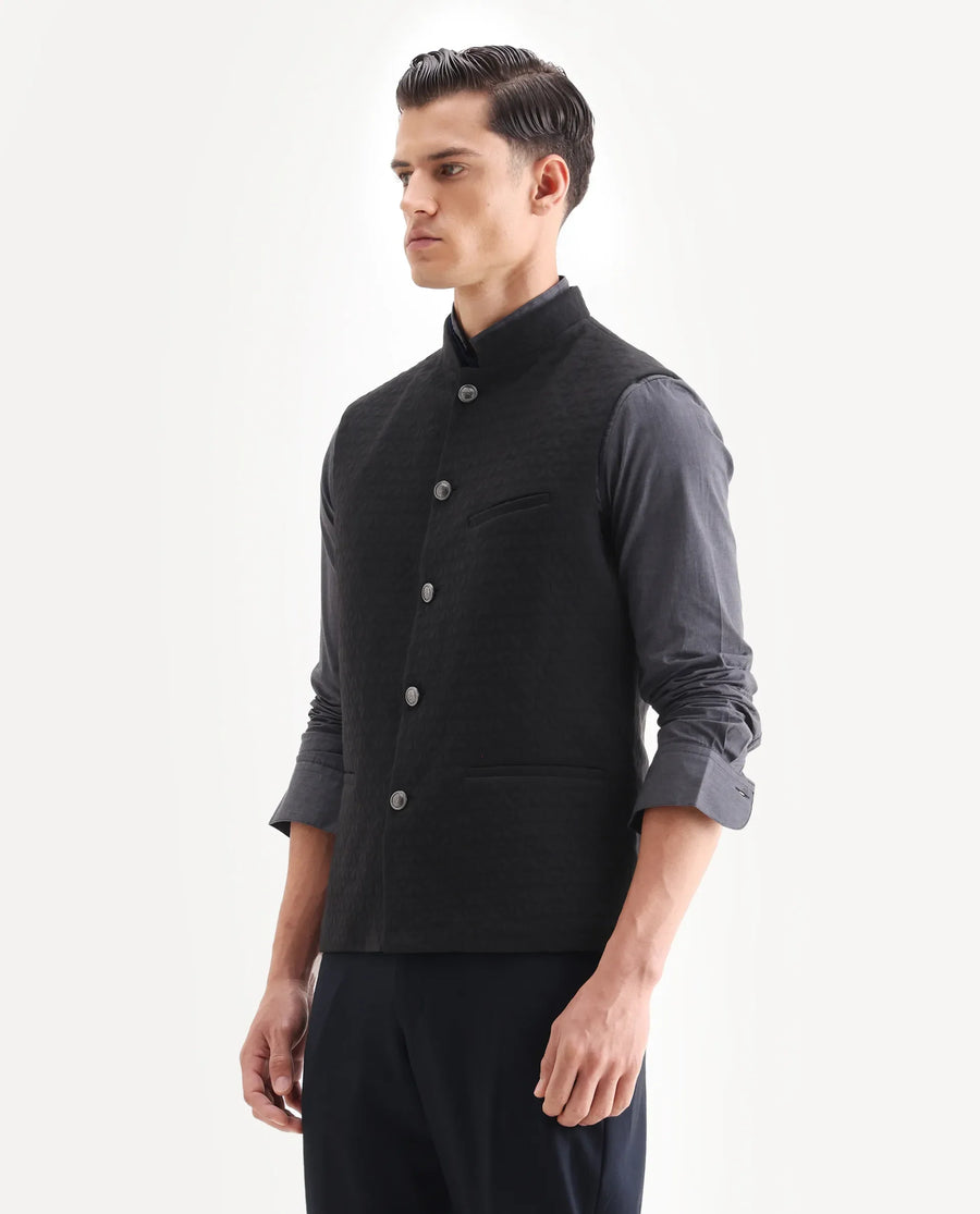 Rare Rabbit Men's Mitzi Black Cotton Jacquard Tailored Fit Sleeveless Mandarin Collar Bandhgala Rare Rabbit Men's Lasmos-B1 Beige Viscose Embroidered Regular Fit Sleeveless Mandarin Collar Bandhgala Nehru Jacket