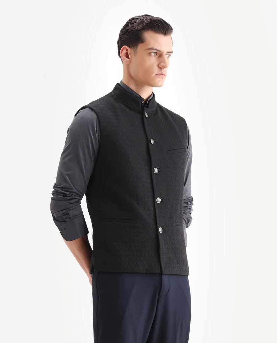 Rare Rabbit Men's Mitzi Black Cotton Jacquard Tailored Fit Sleeveless Mandarin Collar Bandhgala Rare Rabbit Men's Lasmos-B1 Beige Viscose Embroidered Regular Fit Sleeveless Mandarin Collar Bandhgala Nehru Jacket