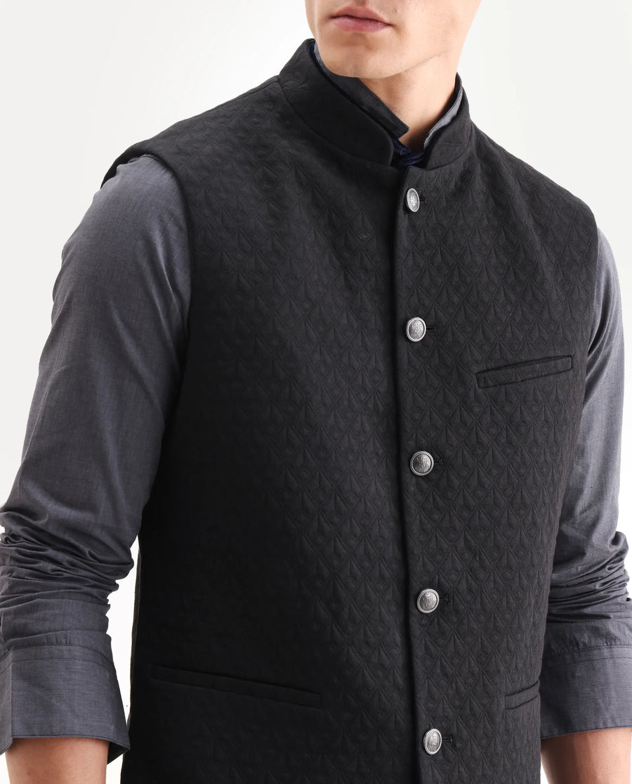 Rare Rabbit Men's Mitzi Black Cotton Jacquard Tailored Fit Sleeveless Mandarin Collar Bandhgala Rare Rabbit Men's Lasmos-B1 Beige Viscose Embroidered Regular Fit Sleeveless Mandarin Collar Bandhgala Nehru Jacket