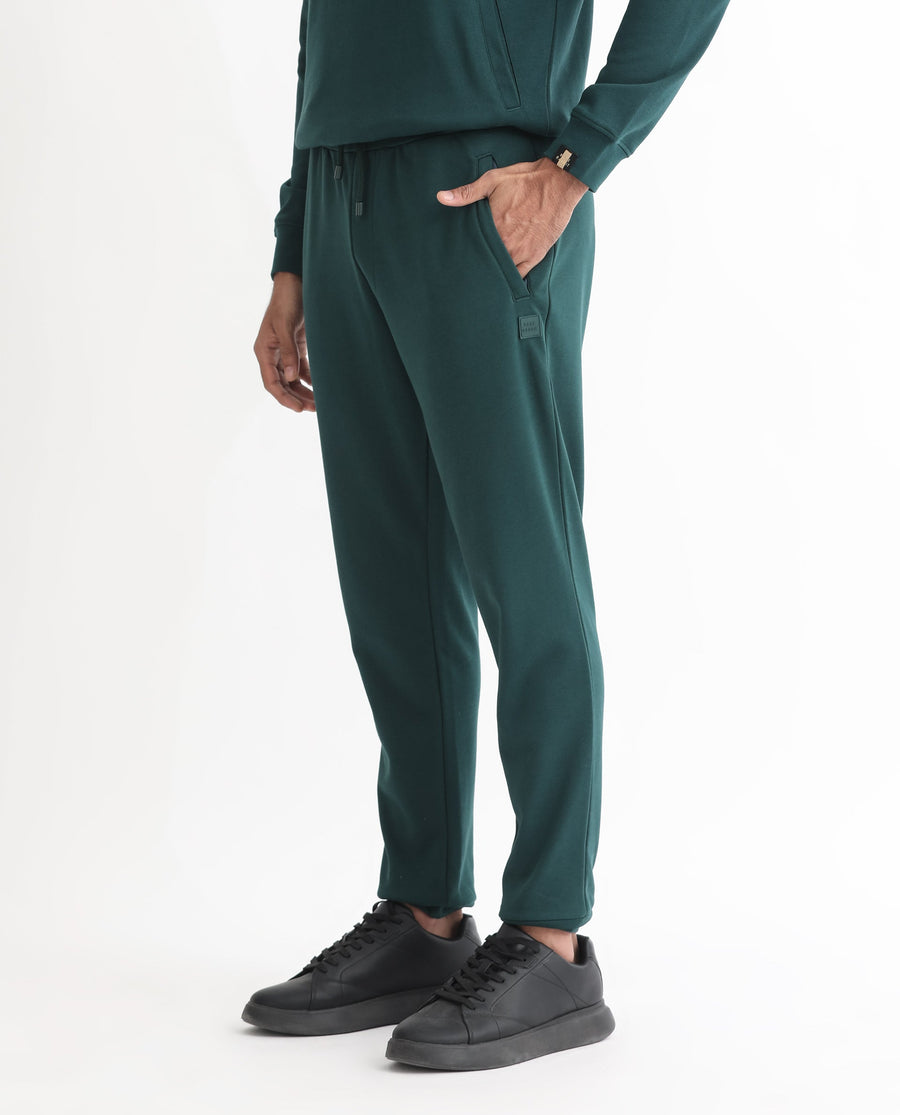 Rare Rabbit Men's Oza Dark Green Cotton Plain Regular Fit Jogers