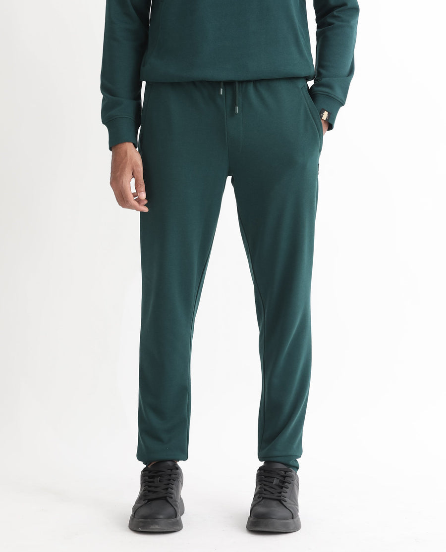 Rare Rabbit Men's Oza Dark Green Cotton Plain Regular Fit Jogers