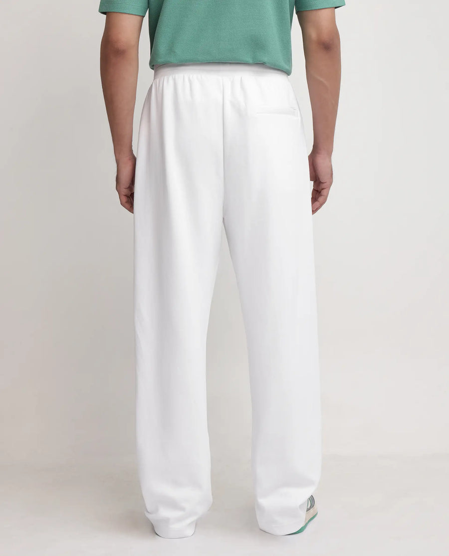 Rare Rabbit Men's Oblic White Cotton Blend Plain Relaxed Fit Track Pant