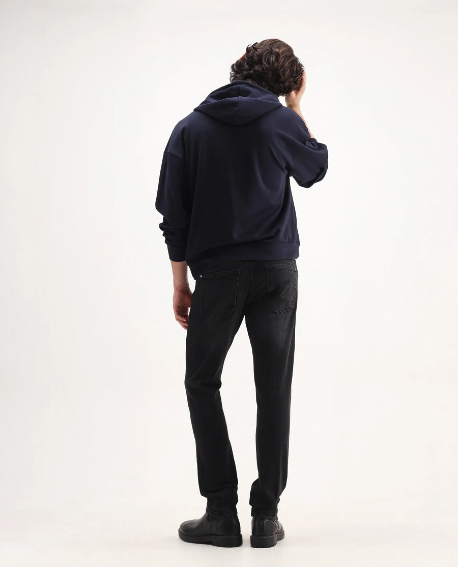 Rare Rabbit Men's Omiros Black Cotton Blend Plain Hawk Slim Fit Jeans