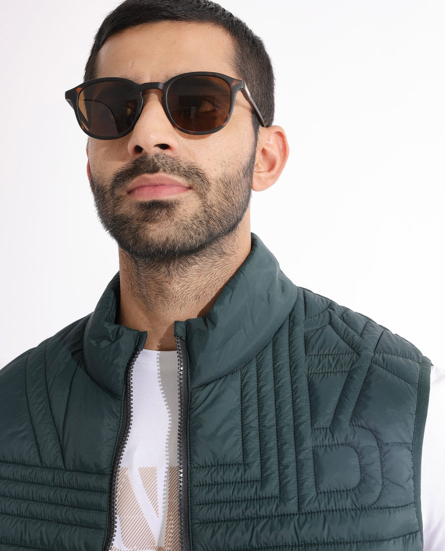 Rare Rabbit Men's Queltex Dark Petrol Nylon Plain Regular Fit Sleeveless High Neck Jacket