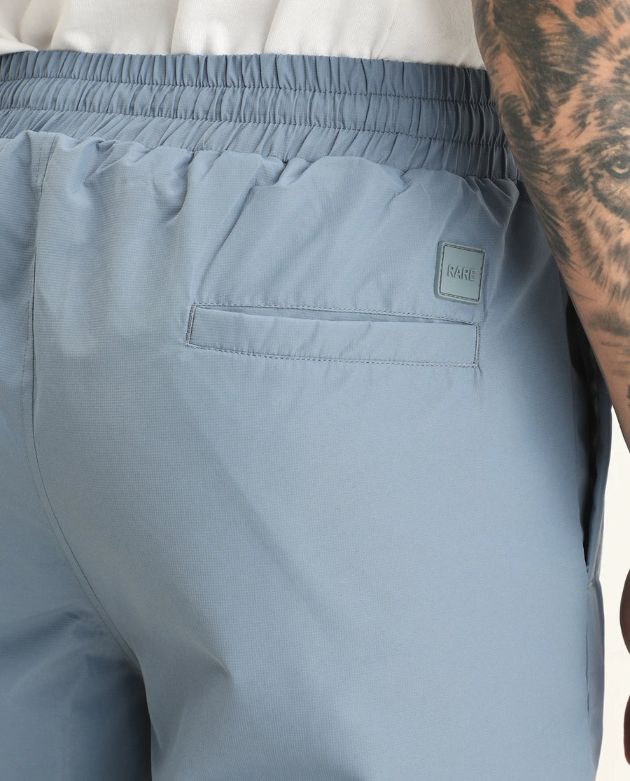 Rare Rabbit Men's Waber-B Light Blue Polyester Cut And Sew Regular Fit Track Pant