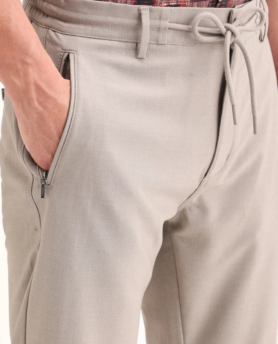 Rare Rabbit Men's Move-Ss26 Light Beige Polyester Blend Fabric Regular Fit Plain Trouser