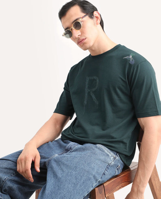 Rare Rabbit Men's Rapot Dusky Green Cotton Fabric Half Sleeve Crew Neck Oversize Fit Graphic Print T-Shirt