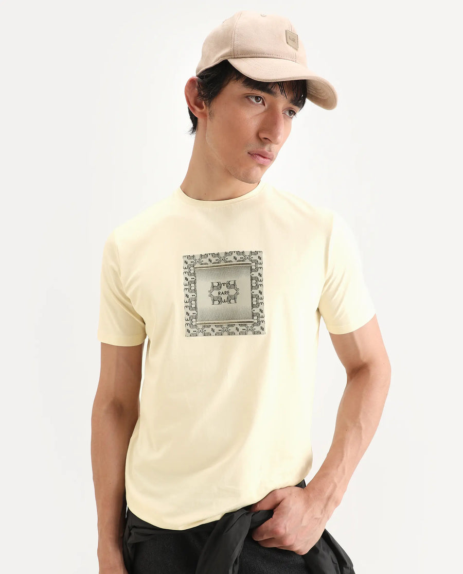 Rare Rabbit Men's Tigo Pastel Yellow Cotton Blend Fabric Half Sleeve Crew Neck Regular Fit Graphic Print T-Shirt