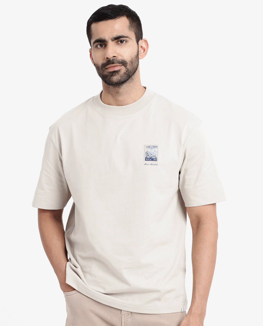 Rare Rabbit Men's Trams Beige Cotton Graphic Print Oversized Fit Half Sleeve Crew Neck T-Shirt