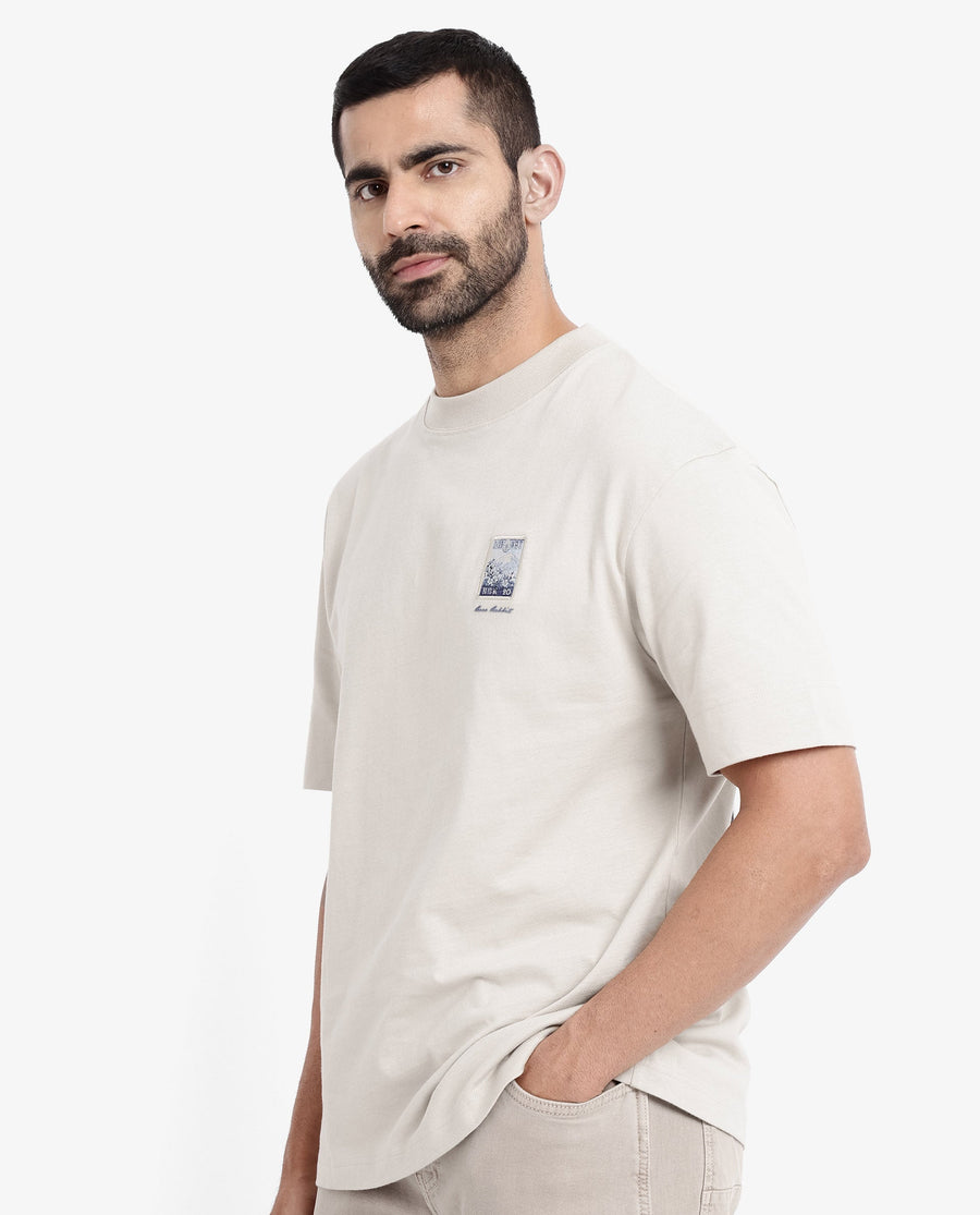 Rare Rabbit Men's Trams Beige Cotton Graphic Print Oversized Fit Half Sleeve Crew Neck T-Shirt