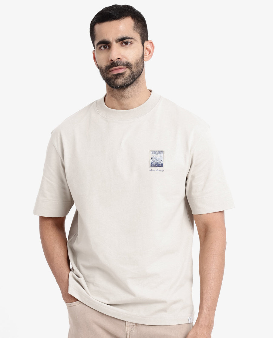 Rare Rabbit Men's Trams Beige Cotton Graphic Print Oversized Fit Half Sleeve Crew Neck T-Shirt