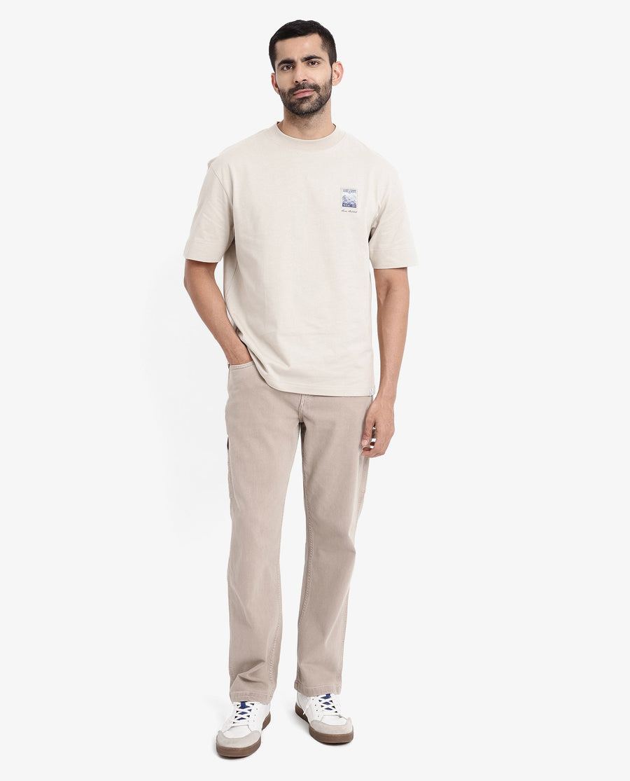 Rare Rabbit Men's Trams Beige Cotton Graphic Print Oversized Fit Half Sleeve Crew Neck T-Shirt