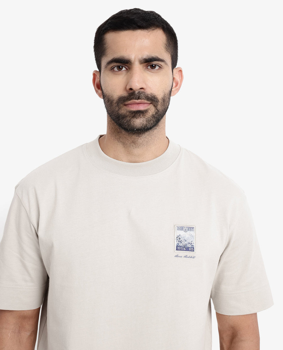 Rare Rabbit Men's Trams Beige Cotton Graphic Print Oversized Fit Half Sleeve Crew Neck T-Shirt