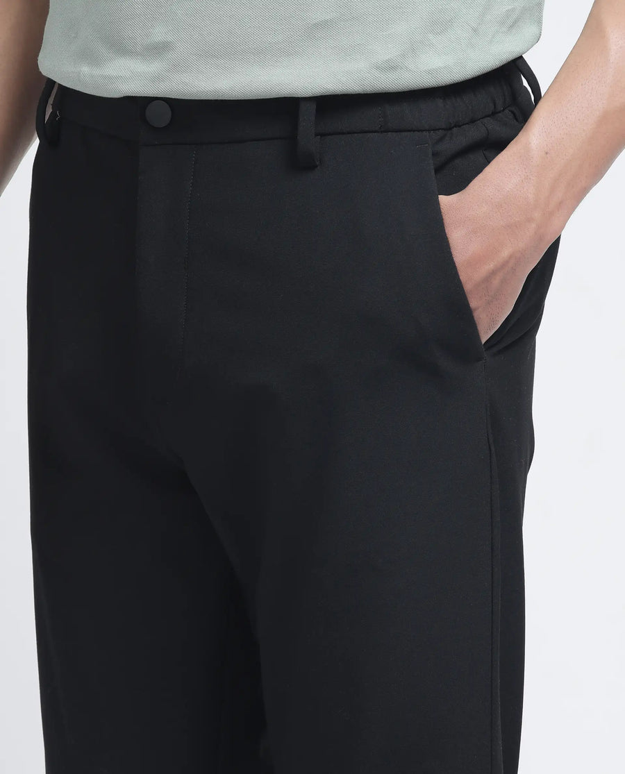 Rare Rabbit Men's Travel-26R Black Polyester Blend Plain Regular Fit Trouser