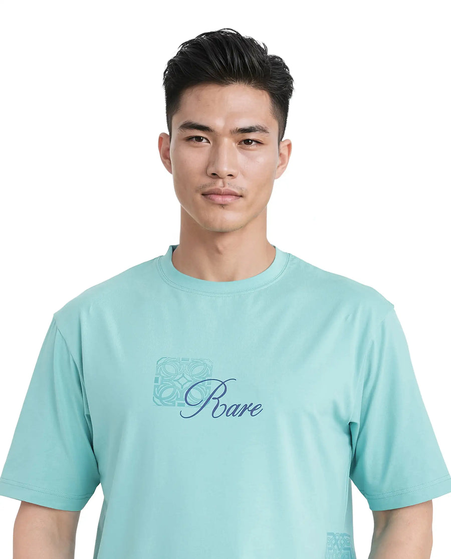 Rare Rabbit Men's Zilos Light Green Cotton Blend Graphic Print Oversized Fit Half Sleeve Crew Neck T-Shirt