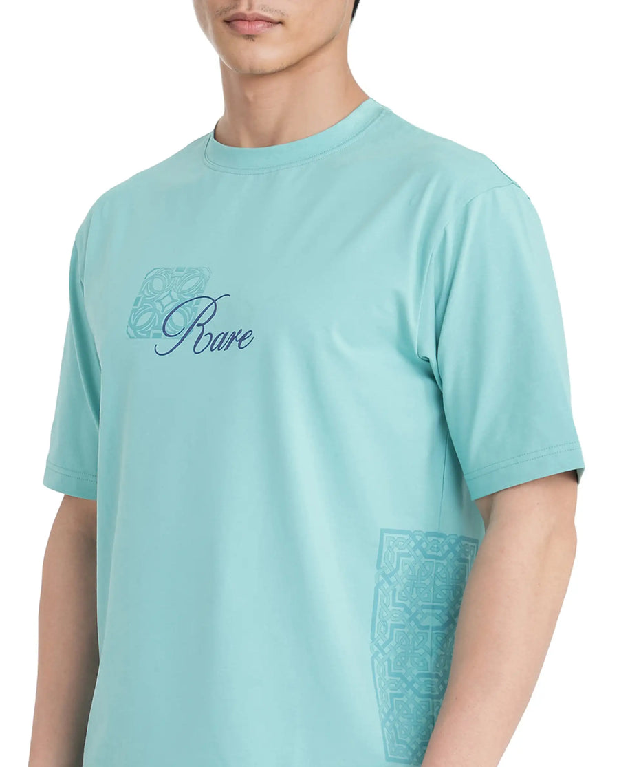 Rare Rabbit Men's Zilos Light Green Cotton Blend Graphic Print Oversized Fit Half Sleeve Crew Neck T-Shirt