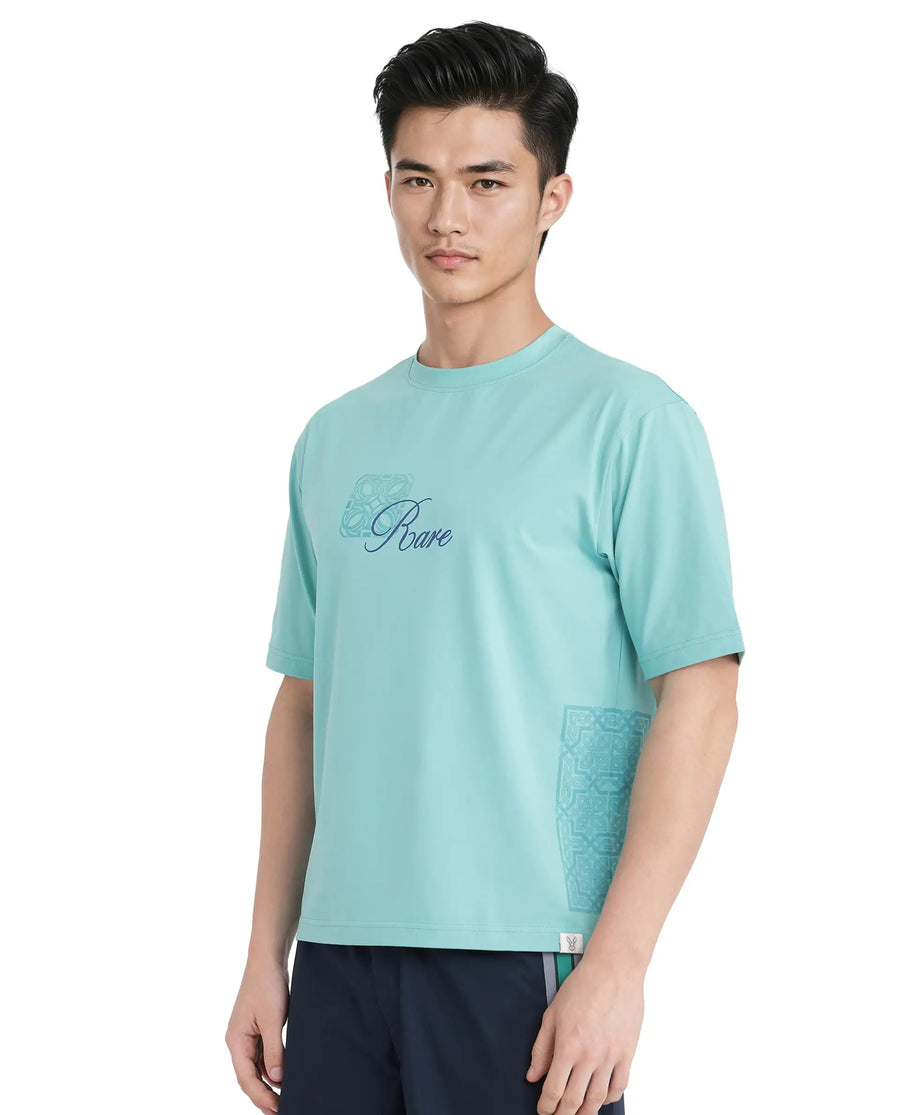 Rare Rabbit Men's Zilos Light Green Cotton Blend Graphic Print Oversized Fit Half Sleeve Crew Neck T-Shirt