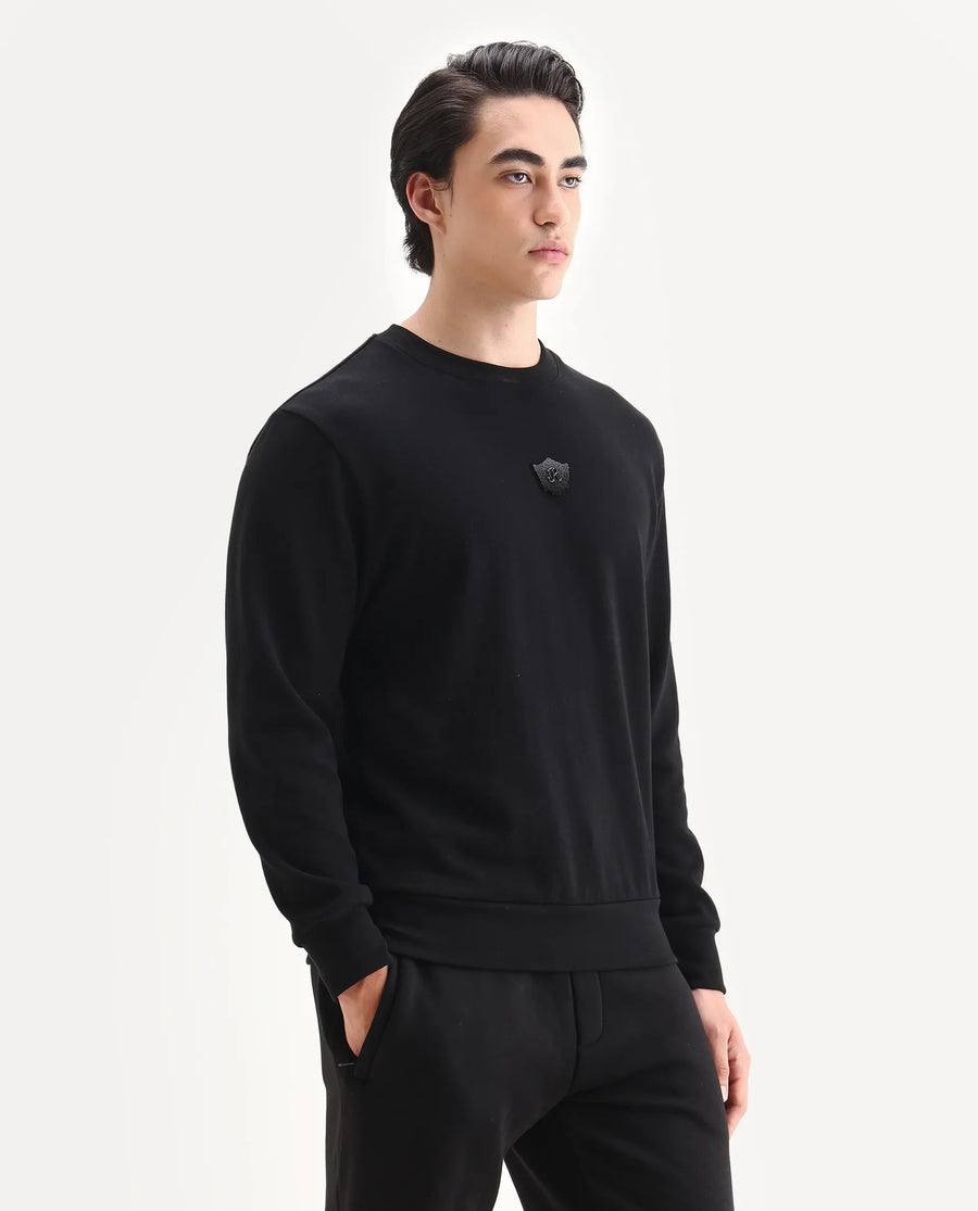 Rare Rabbit Men's Agon Black Rayon Blend Fabric Full Sleeves Crew Neck Badge Print Sweatshirt