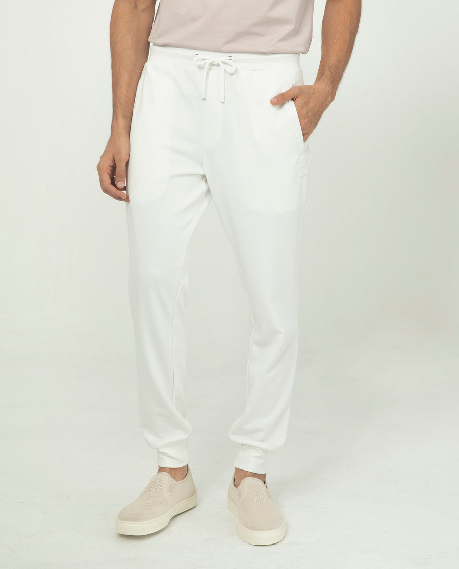 Rare Rabbit Men's Akagi Off White Cotton Plain Regular Fit Joggers