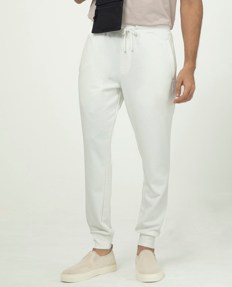 Rare Rabbit Men's Akagi Off White Cotton Plain Regular Fit Joggers