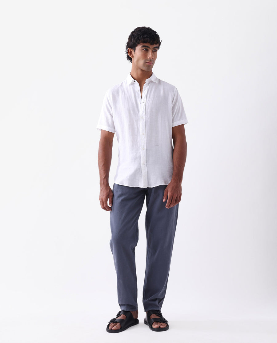 Rare Rabbit Men's Arvi Blue Cotton Plain Dond Carrot Fit Jeans