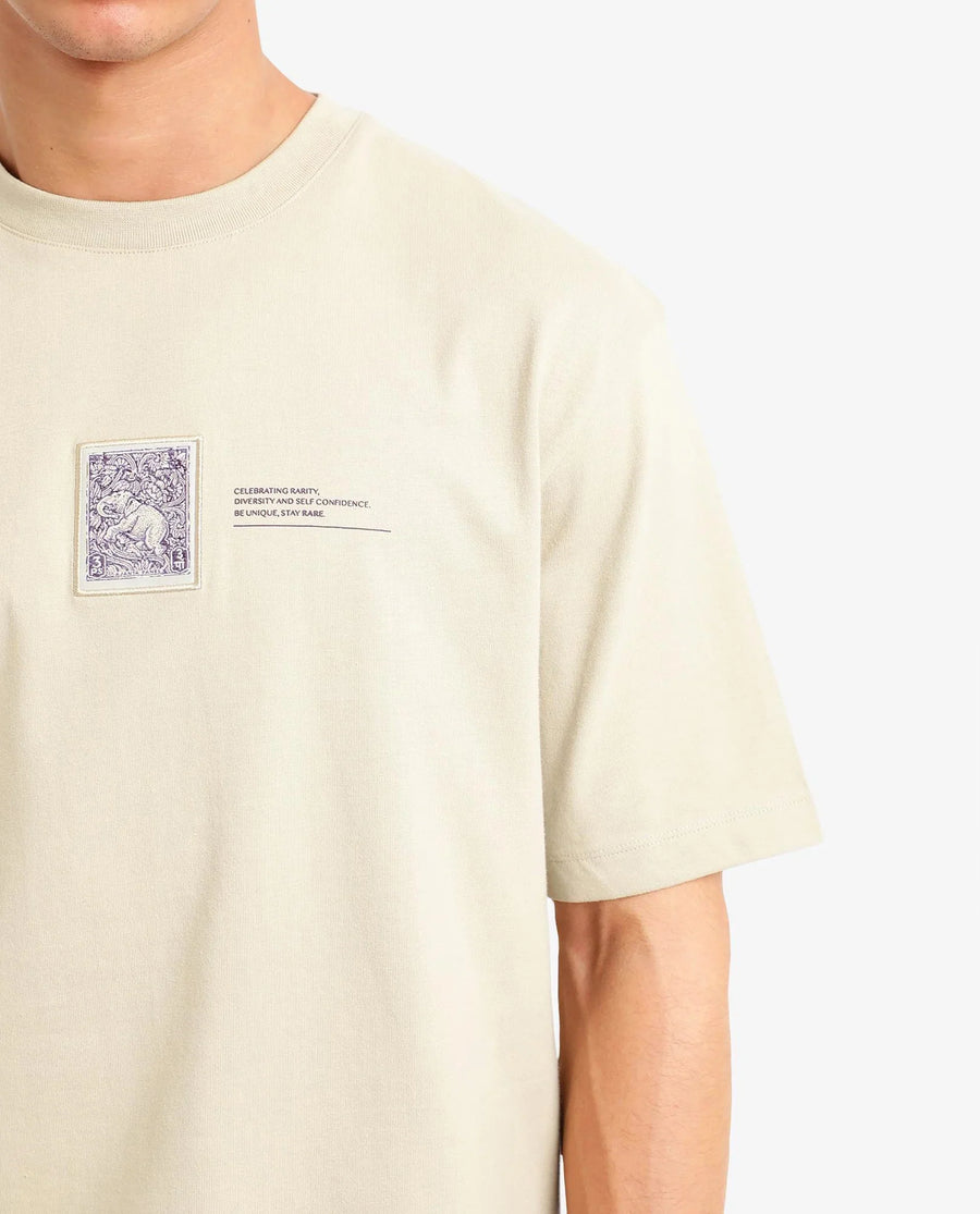 Rare Rabbit Men's Iylo Beige Cotton Graphic Print Oversized Fit Half Sleeve Crew Neck T-Shirt
