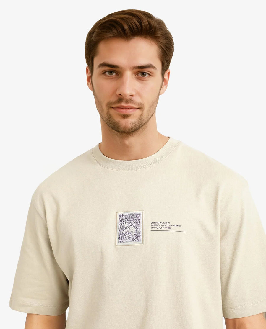 Rare Rabbit Men's Iylo Beige Cotton Graphic Print Oversized Fit Half Sleeve Crew Neck T-Shirt