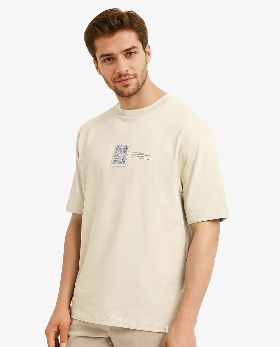 Rare Rabbit Men's Iylo Beige Cotton Graphic Print Oversized Fit Half Sleeve Crew Neck T-Shirt