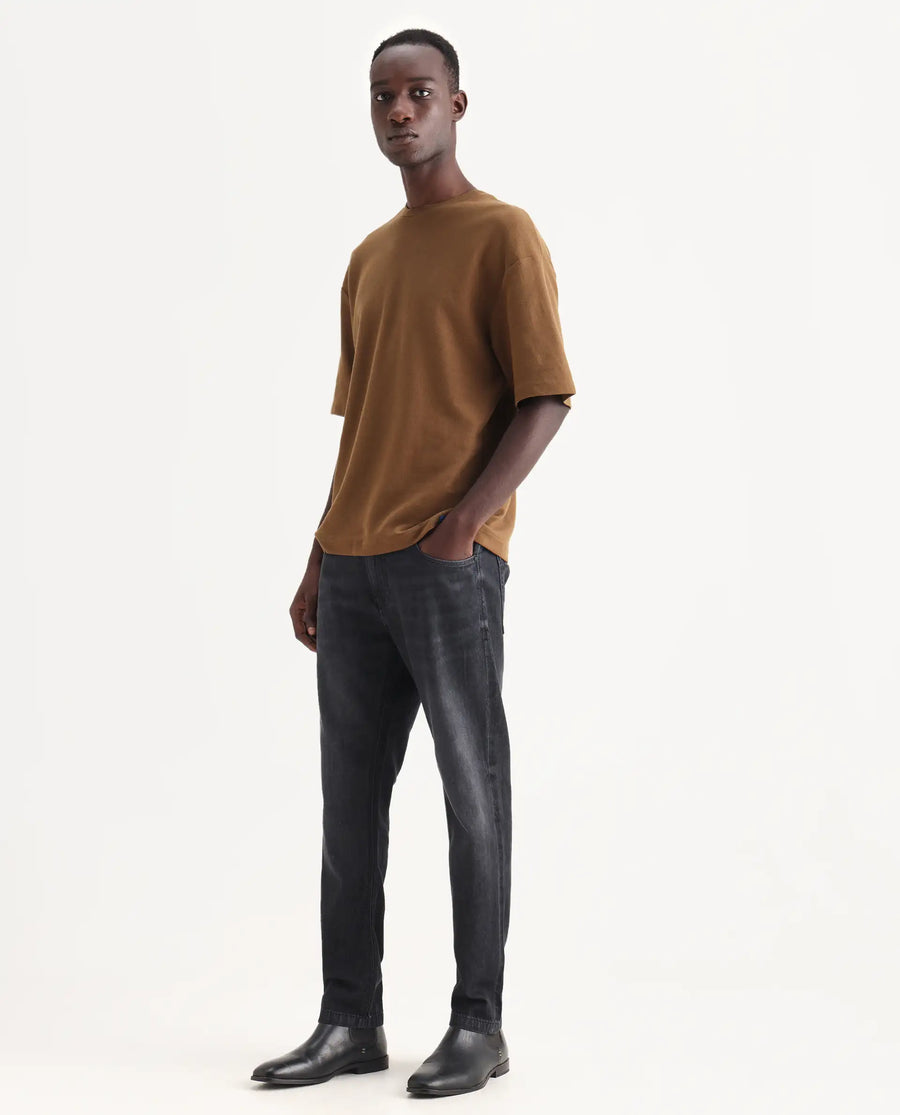 Rare Rabbit Men's Kairo-1 Black Cotton Plain Kurt Carrot Fit Jeans
