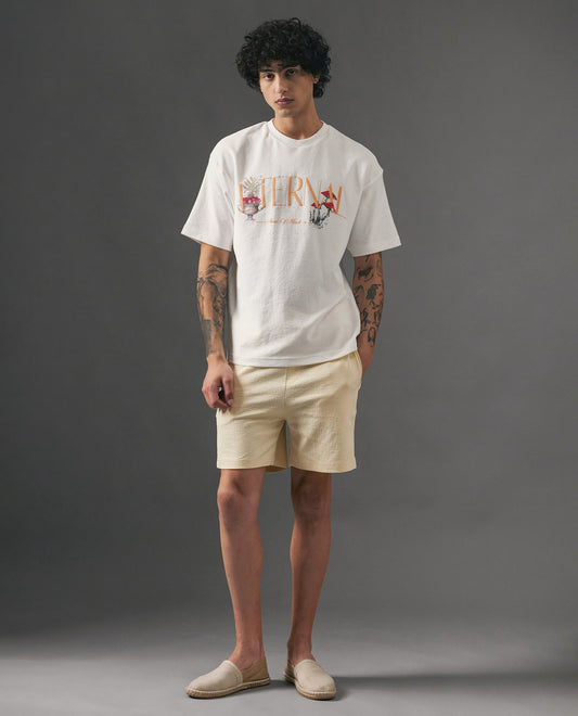 Rare Rabbit Men's Kelor Pastel Yellow Cotton Blend Plain Regular Fit Shorts