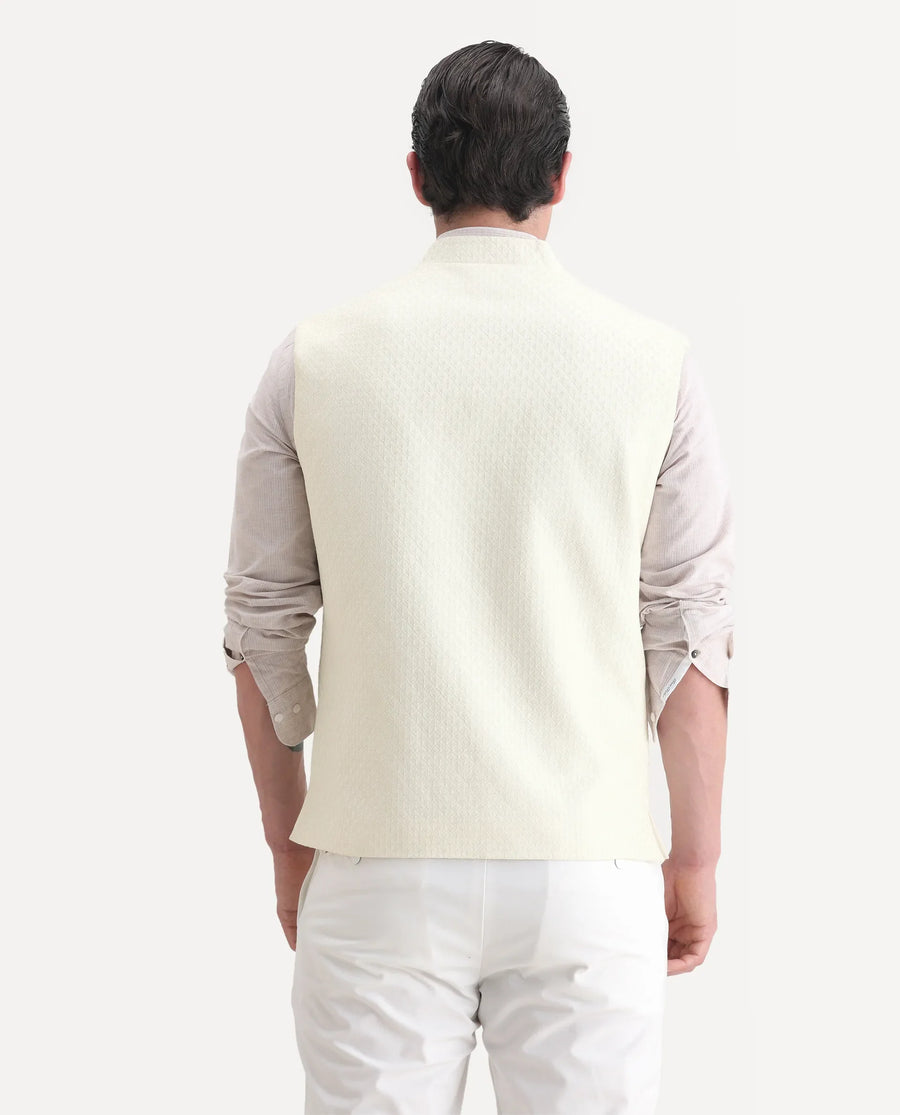 Rare Rabbit Men's Guild Festive Lasmos B1 Off White Viscose Embroidered Regular Fit Sleeveless Mandarin Collar Bandhgala Rare Rabbit Men's Lasmos-B1 Beige Viscose Embroidered Regular Fit Sleeveless Mandarin Collar Bandhgala Nehru Jacket