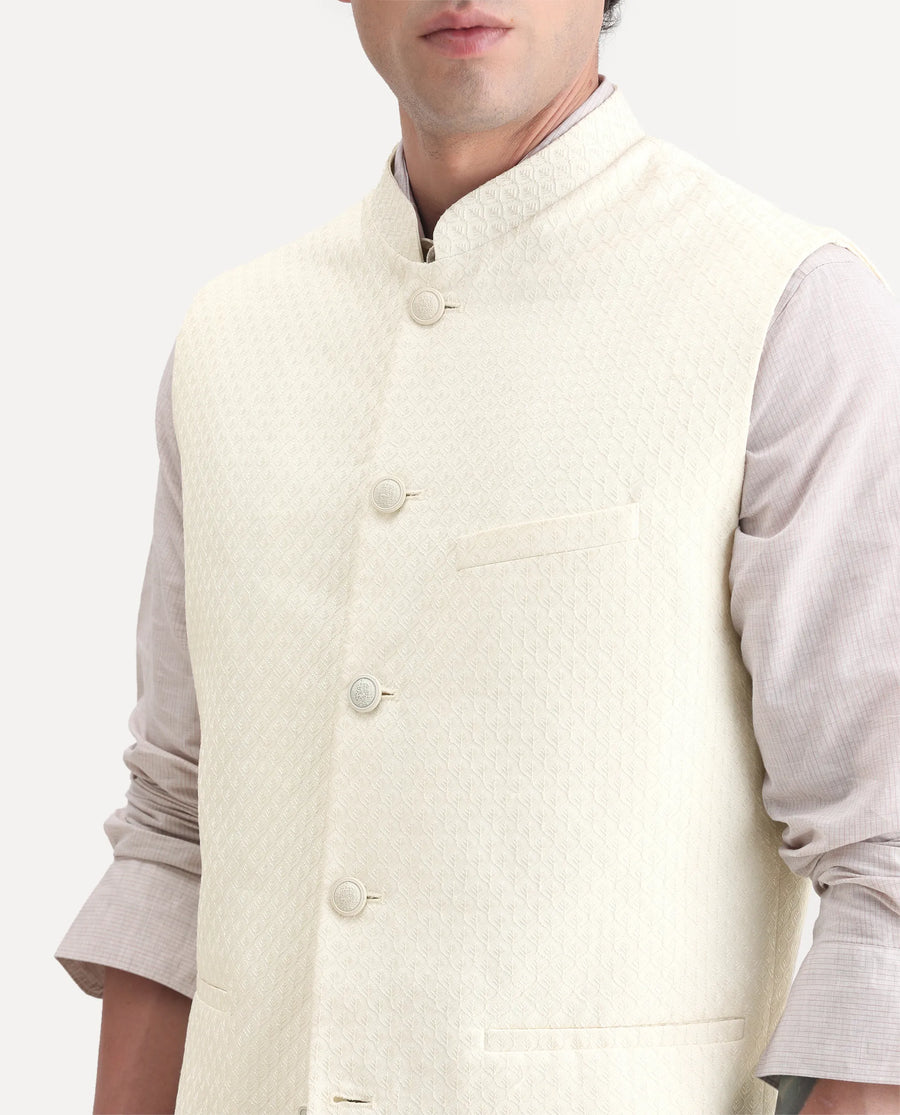Rare Rabbit Men's Guild Festive Lasmos B1 Off White Viscose Embroidered Regular Fit Sleeveless Mandarin Collar Bandhgala Rare Rabbit Men's Lasmos-B1 Beige Viscose Embroidered Regular Fit Sleeveless Mandarin Collar Bandhgala Nehru Jacket