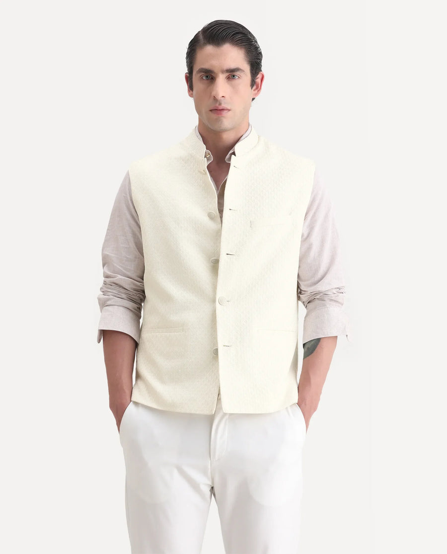 Rare Rabbit Men's Guild Festive Lasmos B1 Off White Viscose Embroidered Regular Fit Sleeveless Mandarin Collar Bandhgala Rare Rabbit Men's Lasmos-B1 Beige Viscose Embroidered Regular Fit Sleeveless Mandarin Collar Bandhgala Nehru Jacket